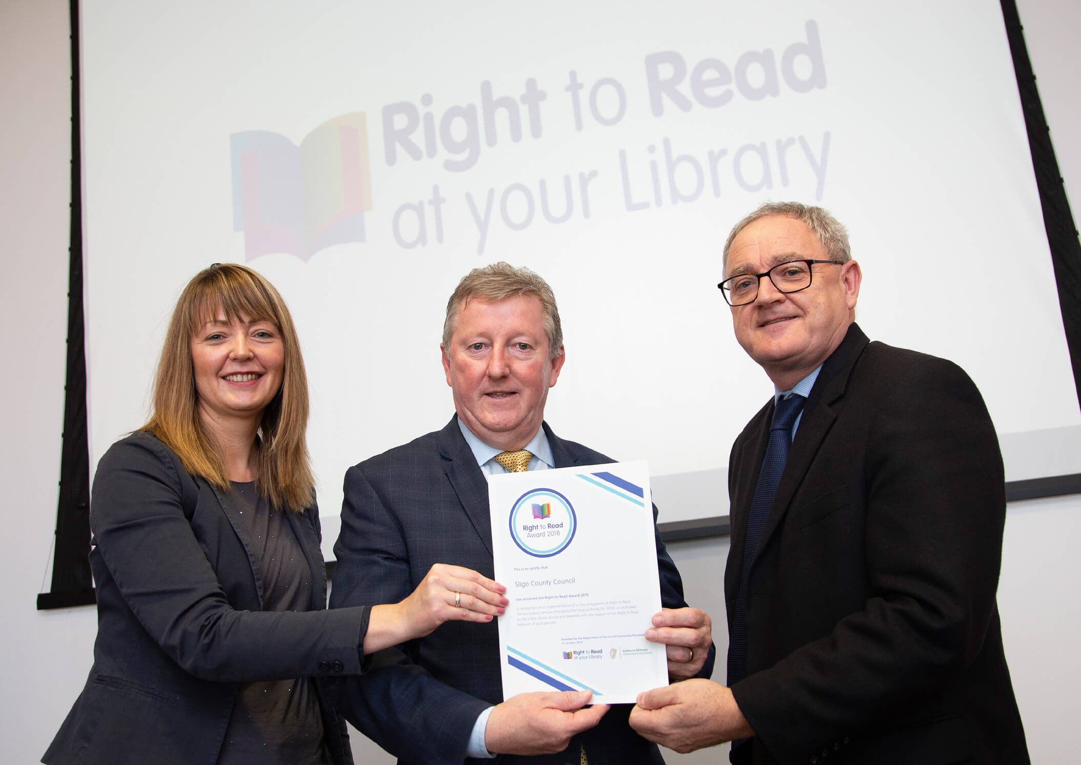 Minister of State Seán Canney presents Right to Read Champion Awards to local authorities